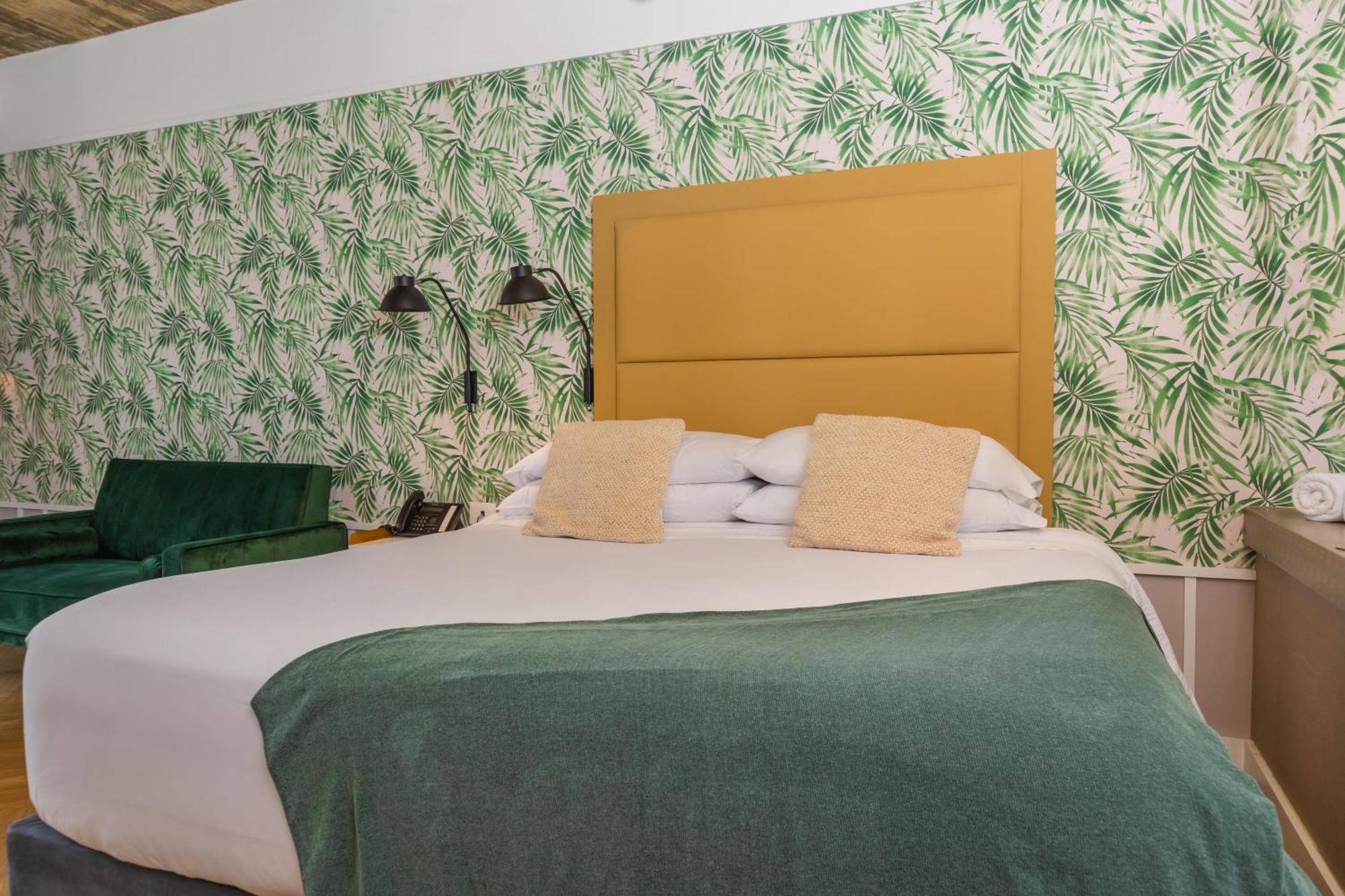 Faranda Collection Barranquilla, A Member Of Radisson Individuals Hotel บาร์รังกีญา ภายนอก รูปภาพ A bedroom at the hotel