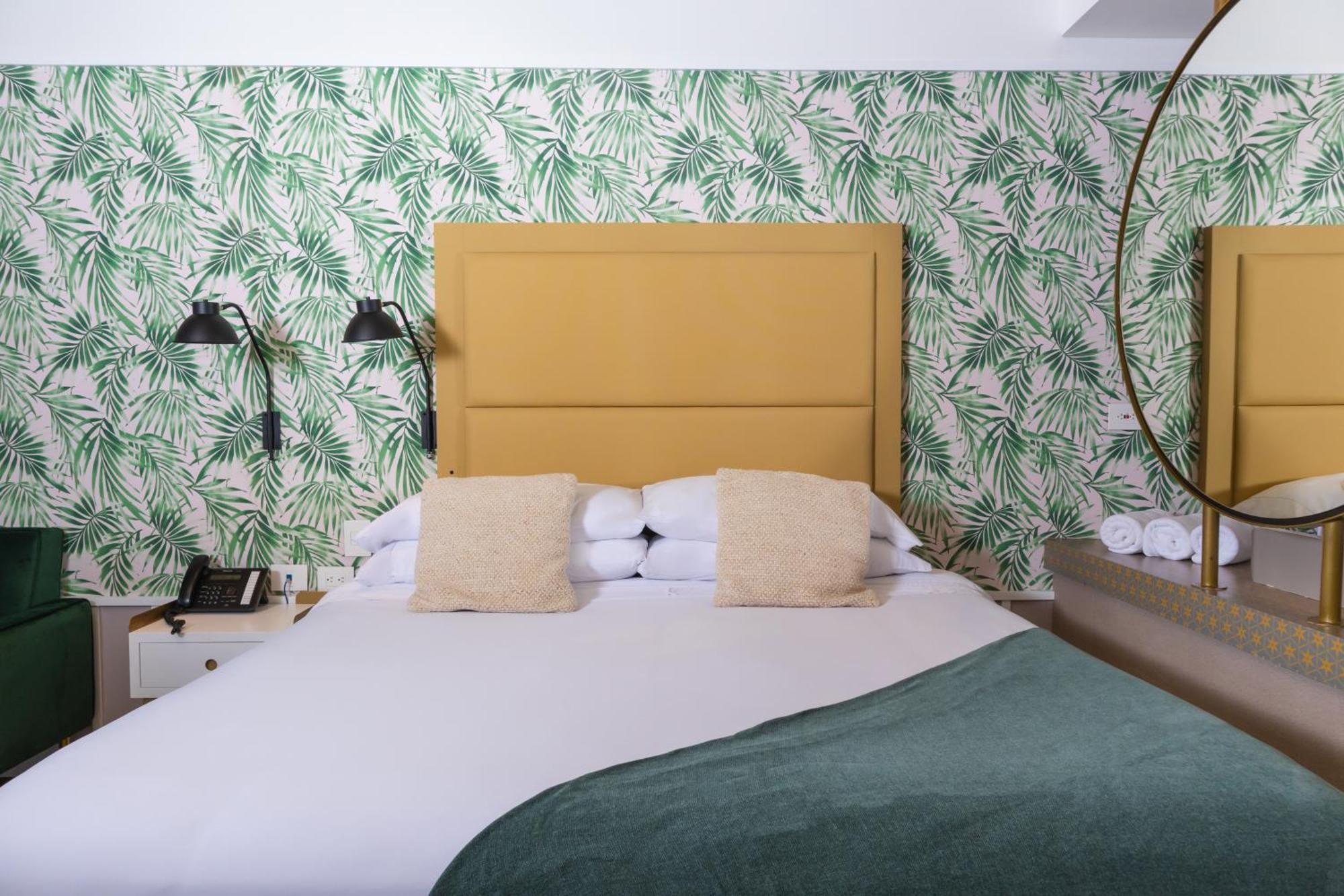Faranda Collection Barranquilla, A Member Of Radisson Individuals Hotel บาร์รังกีญา ภายนอก รูปภาพ A bedroom at the hotel