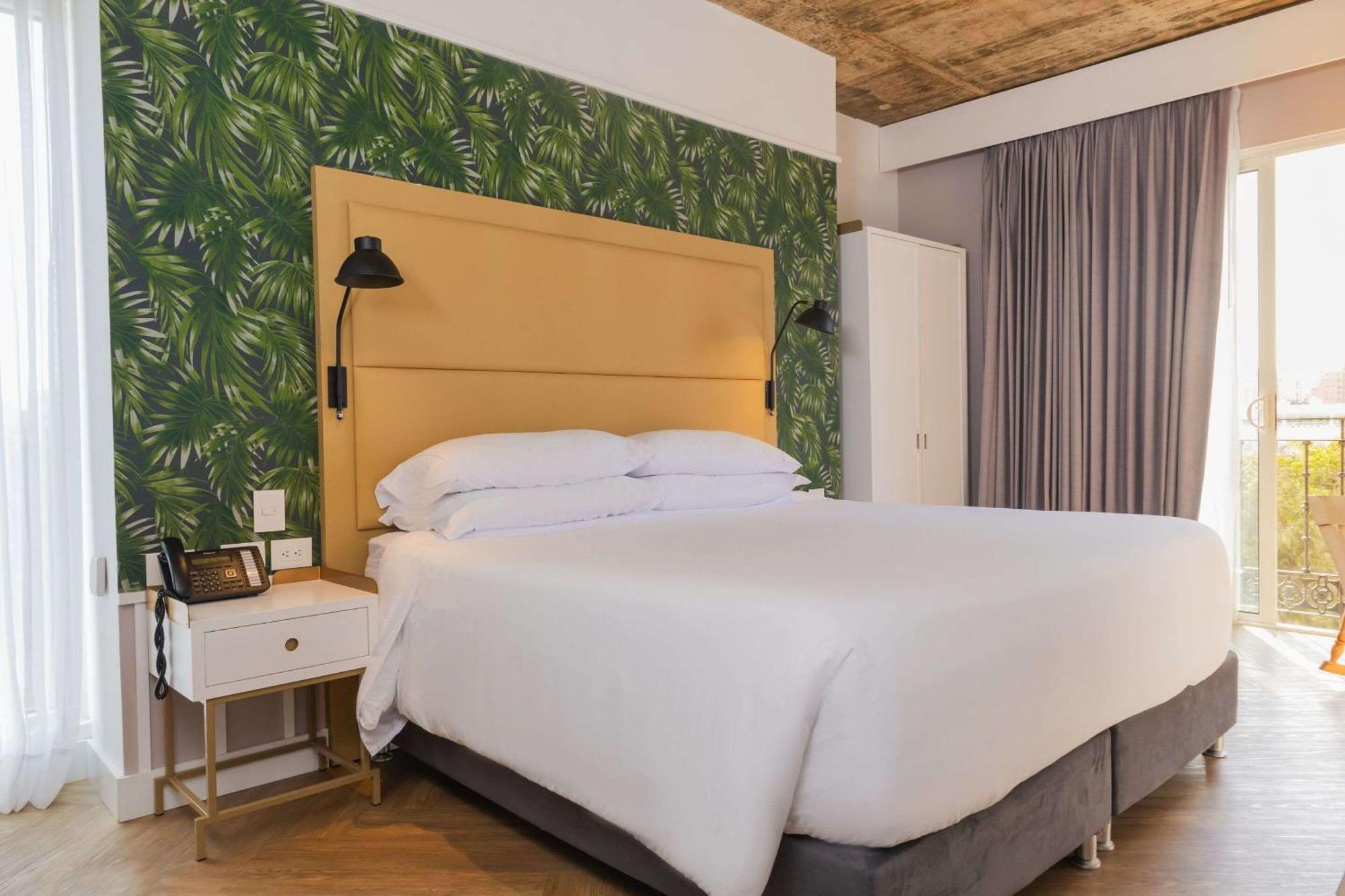 Faranda Collection Barranquilla, A Member Of Radisson Individuals Hotel บาร์รังกีญา ภายนอก รูปภาพ A bedroom at the hotel